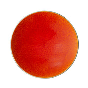 orangefarbener flacher Teller