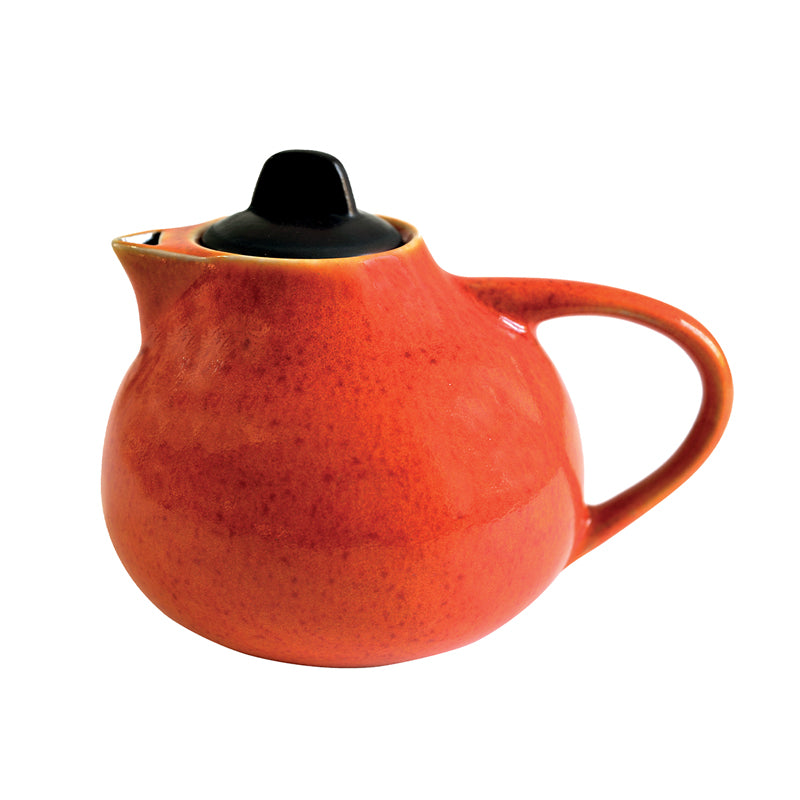 orangefarbene Teekanne